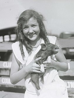 Girl holding piglet_Journal-374N0853.jpg