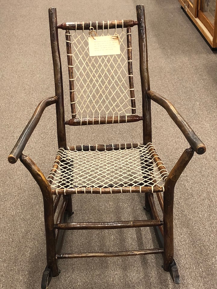 This rocker was made by Chino Berdugo. The frame is made of willows, and the seat and back are made from woven rawhide. The rawhide portions were restored by Earl "Buck" Miller.
