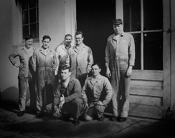 Carl Trussell, Glenn Trussell, Bob Trussell, unknown man, and Leroy (last name unknown). Front row: Homer Rue and Ken Trussell.