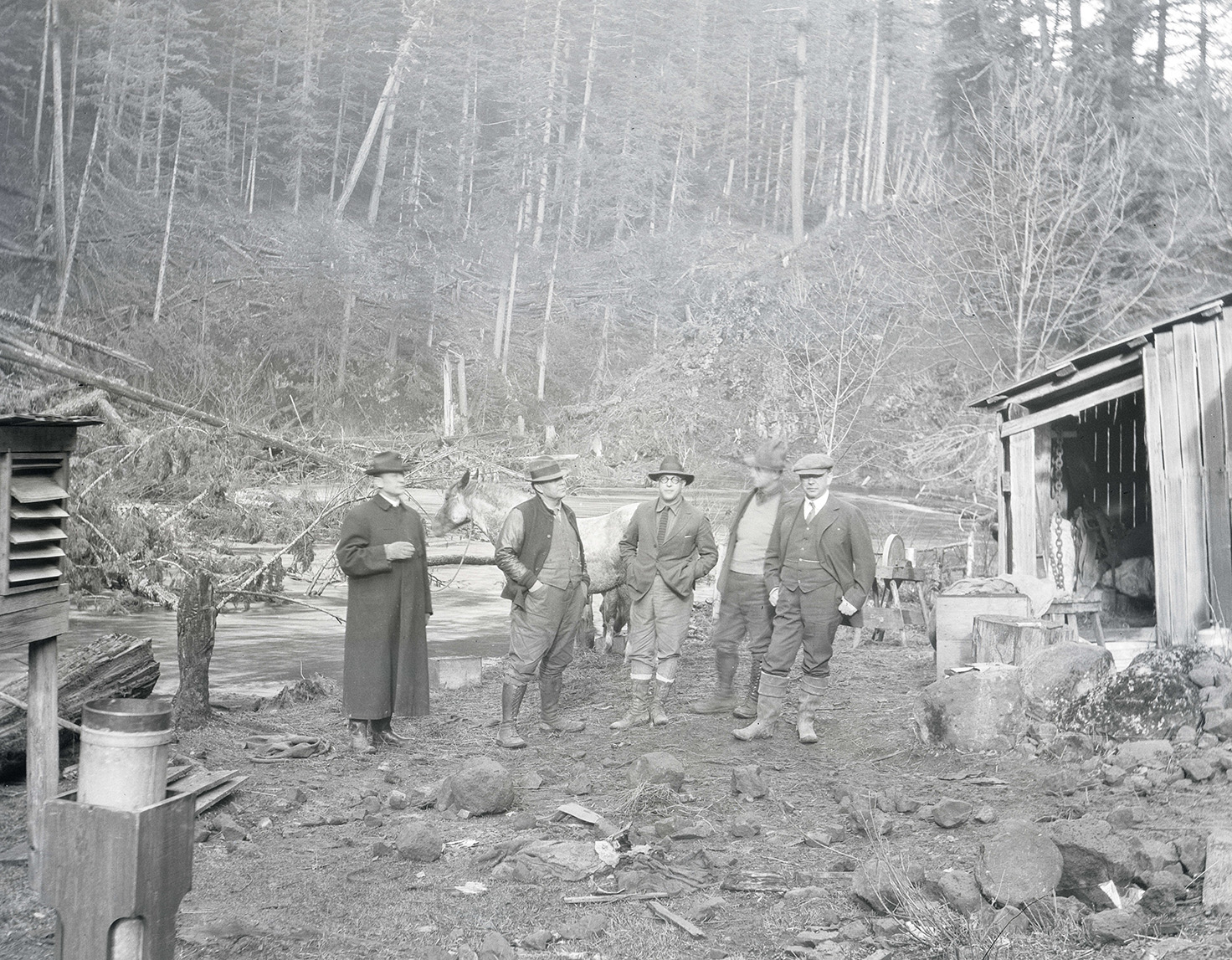 From left: Franklin T. Griffith (President), O.B. Caldwell (Vice President), G.L Estabrook at far right (Secretary and Assistant Treasurer).