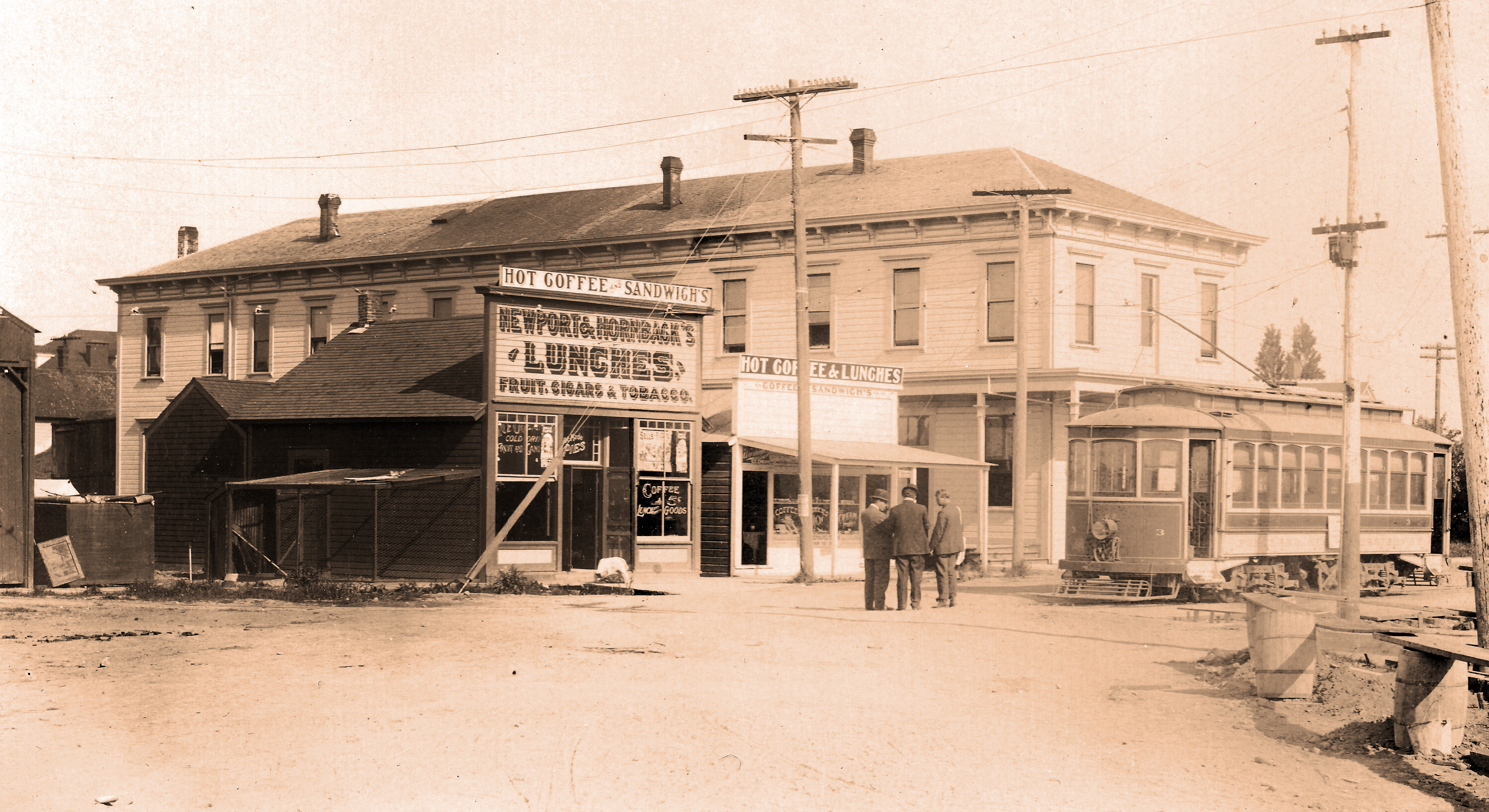 Albany streetcar No. 3 in front of Newport and Hornback lunch counter and Depot Hotel on Lyon St., 1910s.