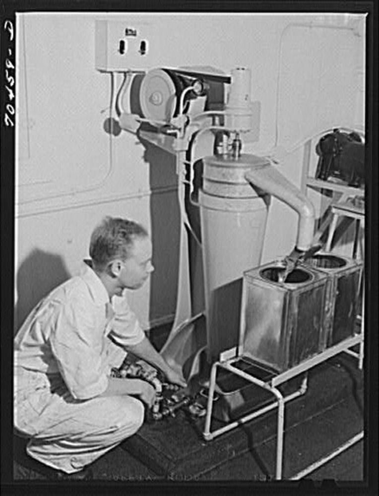 Fish oil running into containers at the CRPA, Astoria, Sept. 1941.