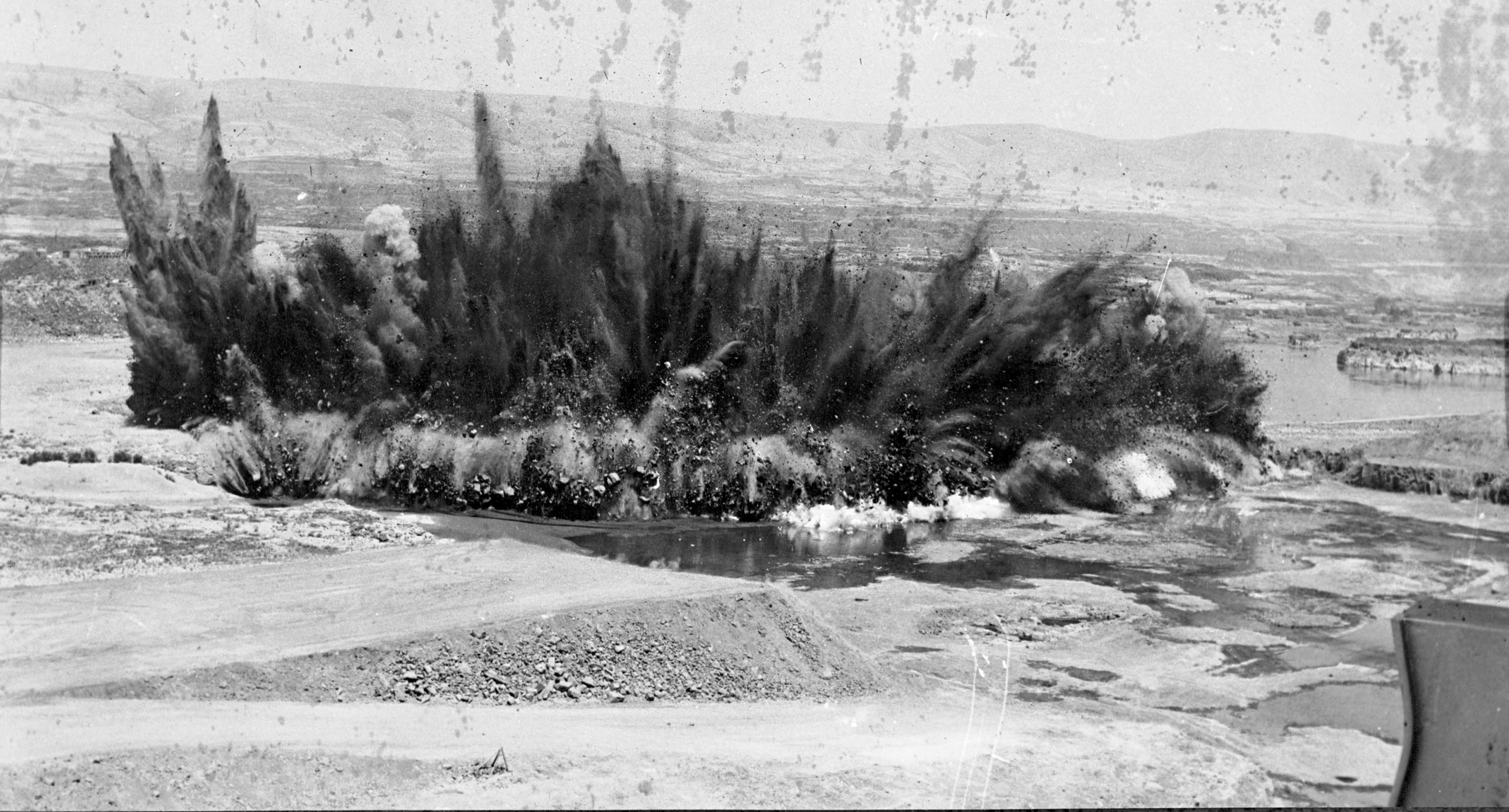 Creating The Dalles Dam, Aug. 1956. This blast was more than 20 tons of powder and removed 60,000 cubic yards of basalt.