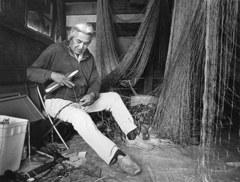 David Sohappy mending fish nets at Cook's Landing, Washington.