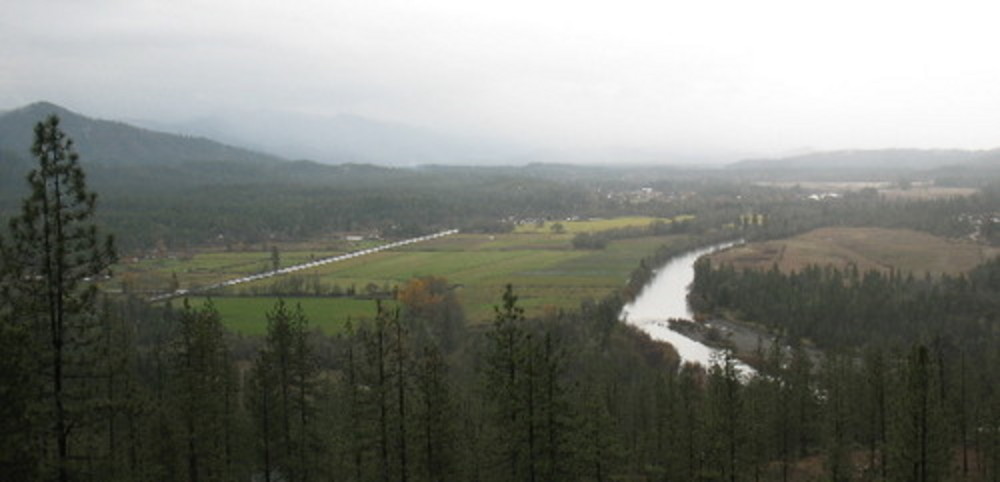 View from road to summit of Eight Dollar Mountain, with Illinois River on right and Kerby in the distance.