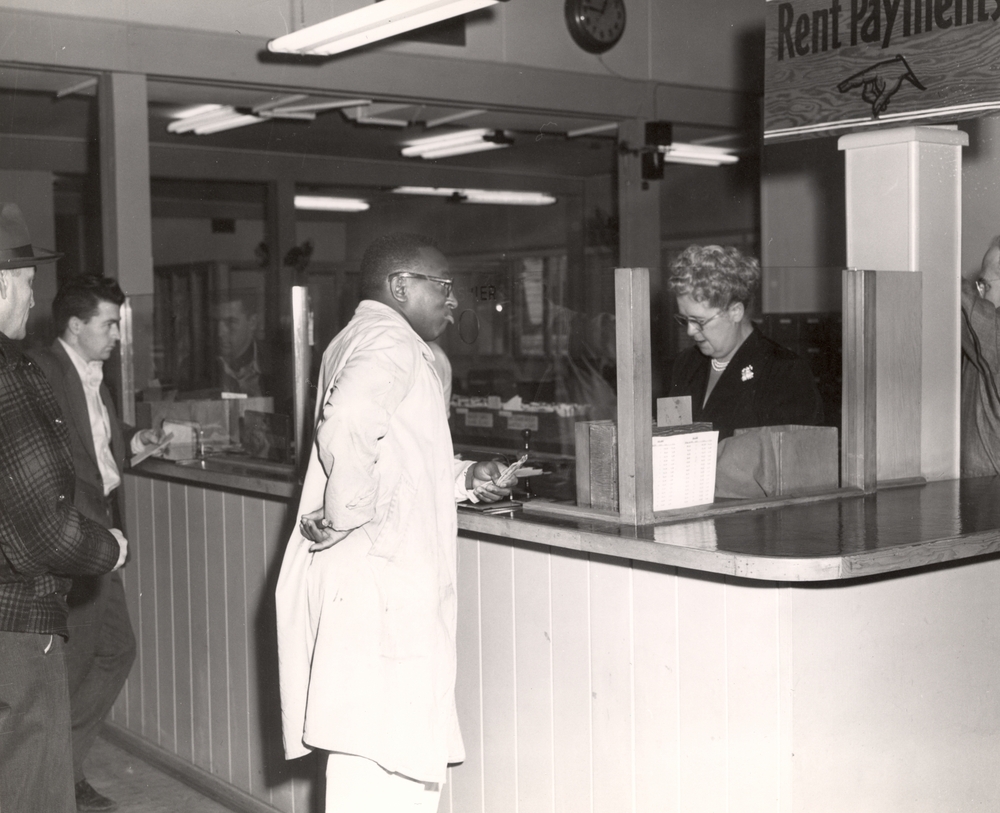 Paying rent at a Housing Authority of Portland location, about 1945.
