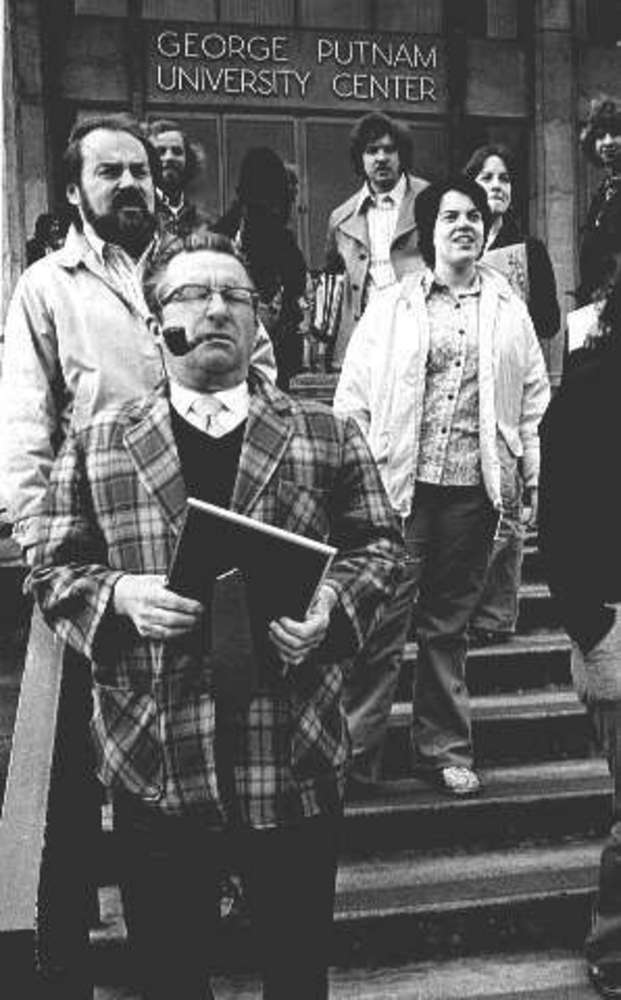 Carl Hall (front left) with students and faculty at George Putnam University Center, Willamette University, April 1975.