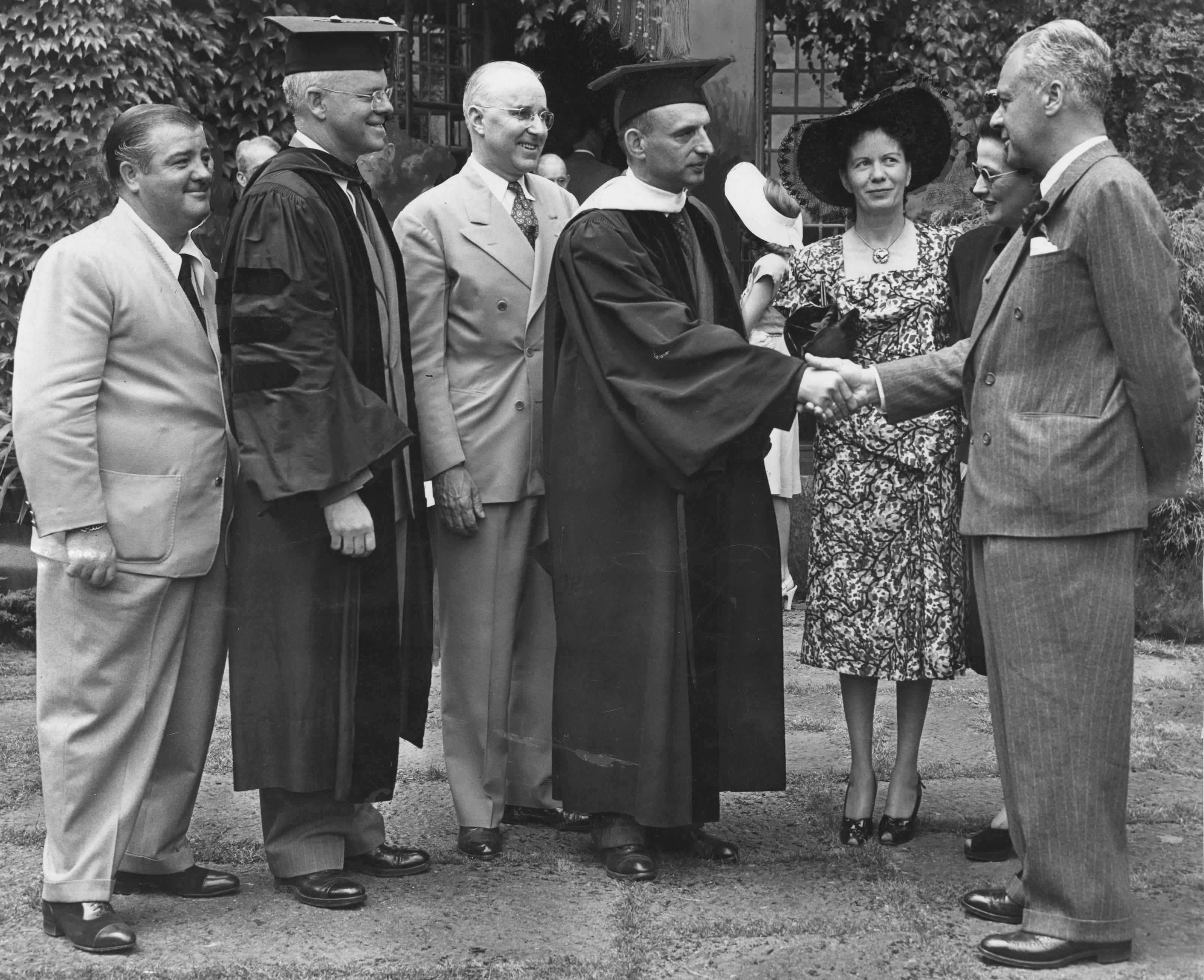 Ernest Haycox (in gown, r) receiving honorary doctorate from Lewis and Clark College, June 11, 1946. (L to R): Lou Costello, college president Dr. Morgan S. Odell, Governor Earl Snell, Mrs. Haycox and Mrs. Snell.