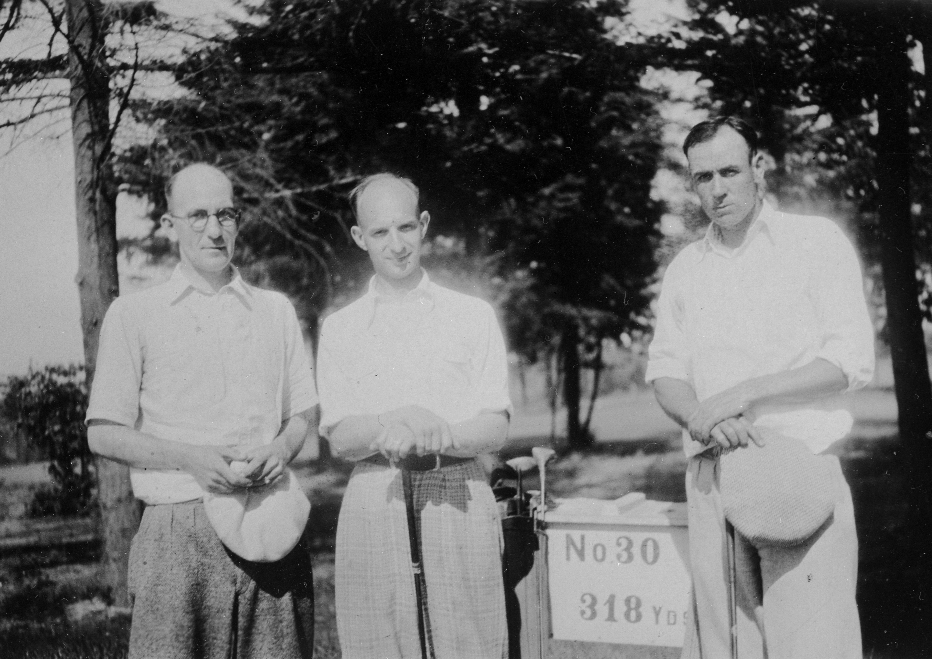 (l to r) Arthur B. Epperson, Ernest Haycox, and Bob Case on golf course, about 1928.