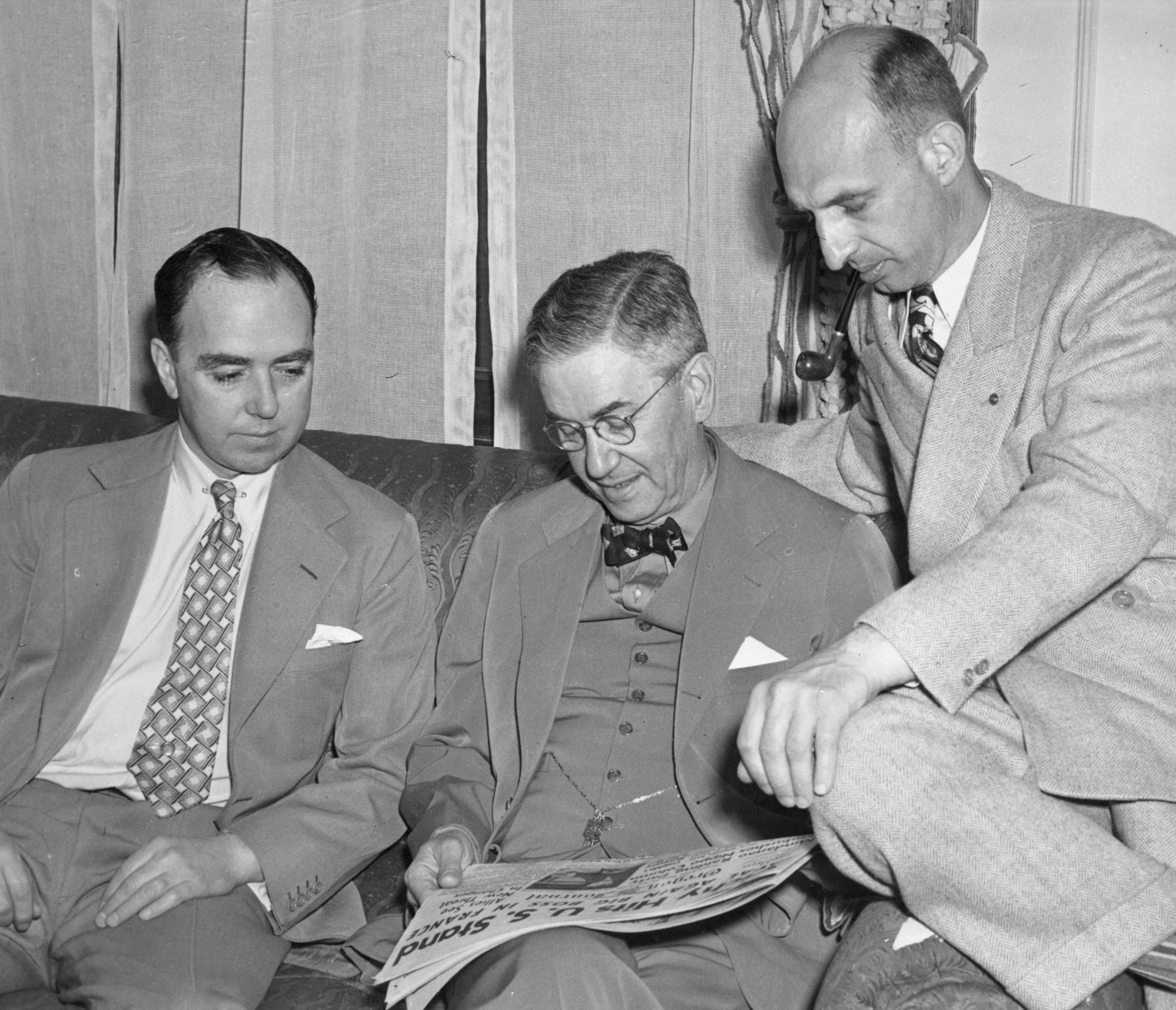(l to r) Eugene Raynal, publisher, William Chenery, Colliers editor, and Ernest Haycox, April 1942.