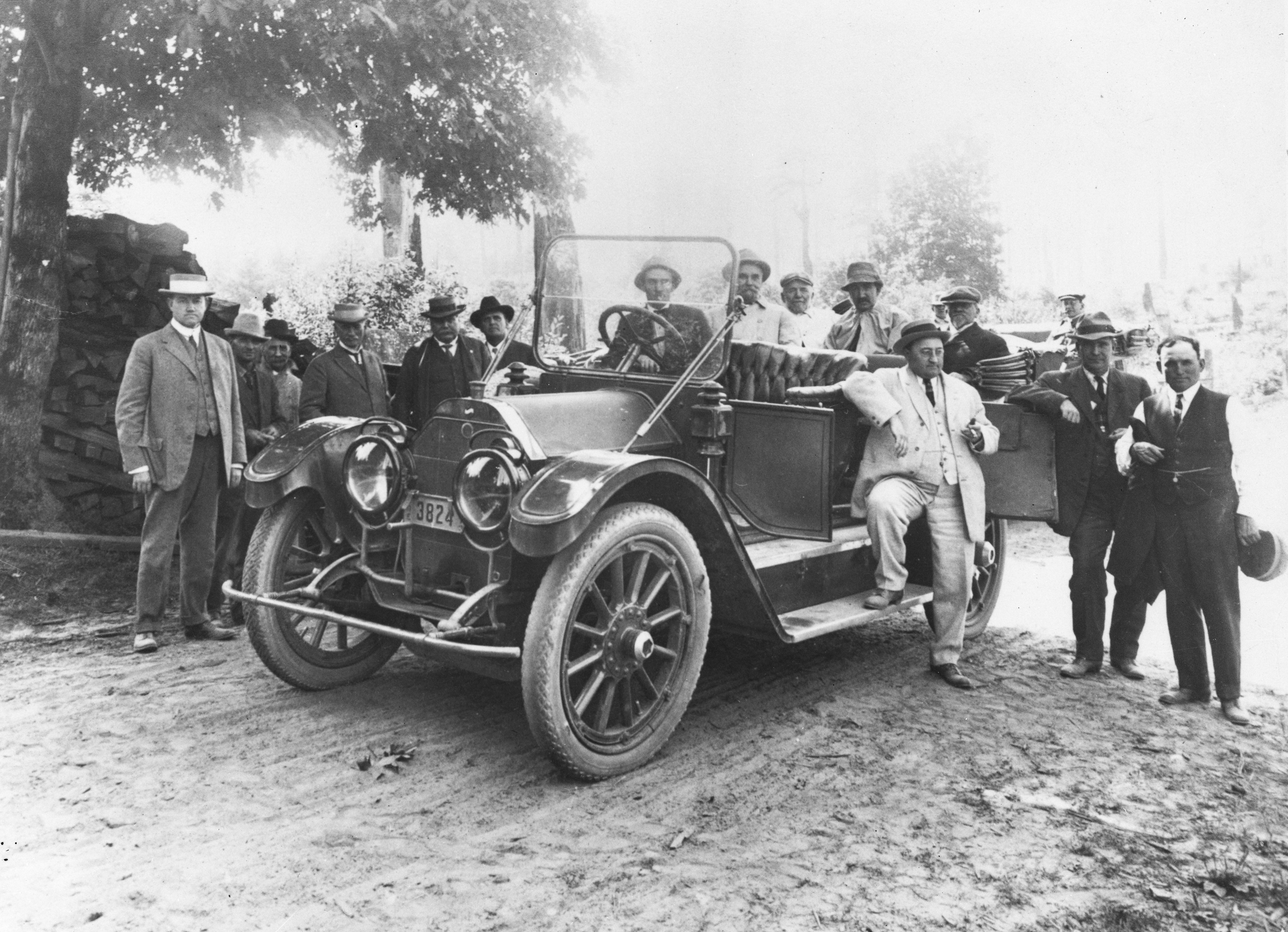 Samuel Hill (front, white suit) and others on the Columbia River Highway, 1913.