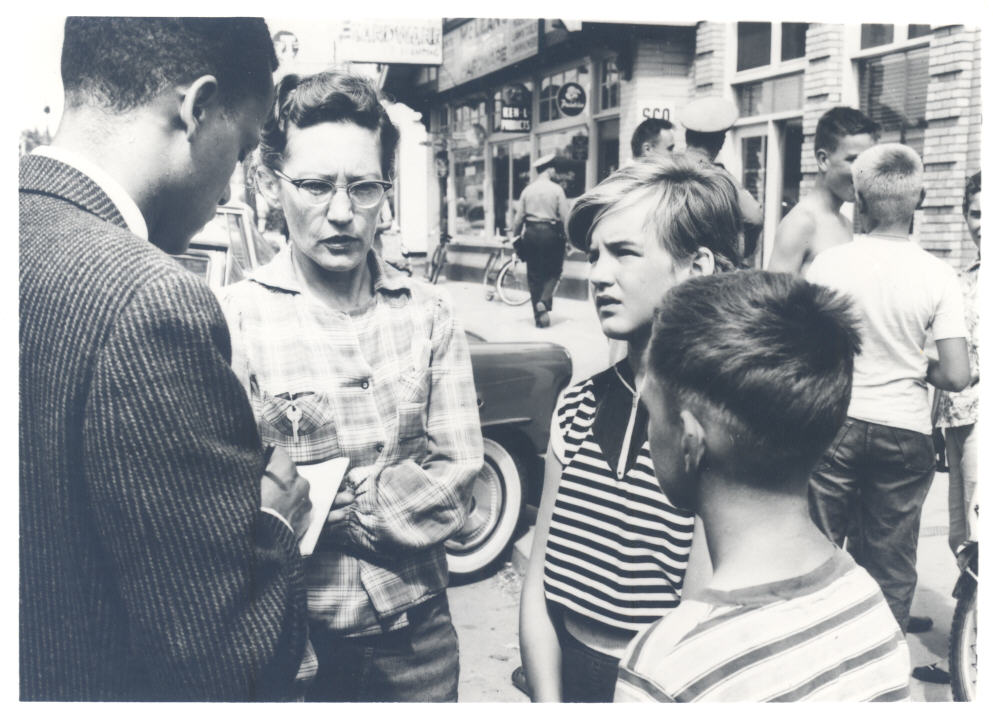 William Hilliard, interviewing witnesses of a bank robbery