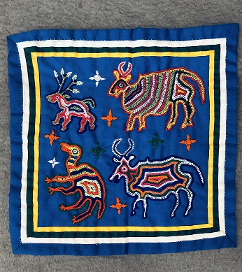 Donated by Ruth Dowdakin. Various items of Hmong needlework acquired by donor when she worked as a volunteer ESL teacher at Sunnyside school in Portland, Oregon, in the 1970s/1980s.
