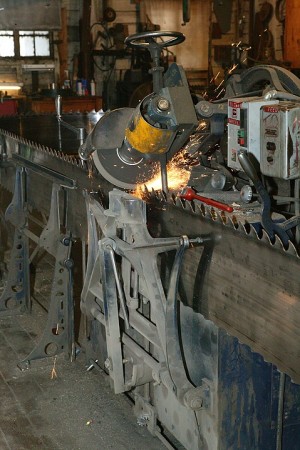 Sharpening bandsaw blade, Hull-Oakes Lumber Mill, Feb. 2011.