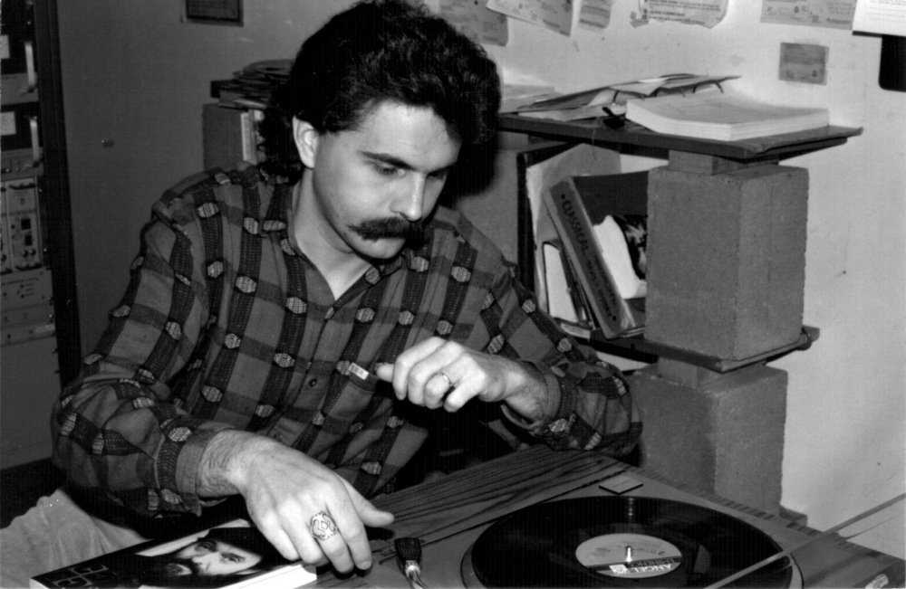 John Baxter, JPR Program Director from 1979 – 1997, cues a recording around 1984.