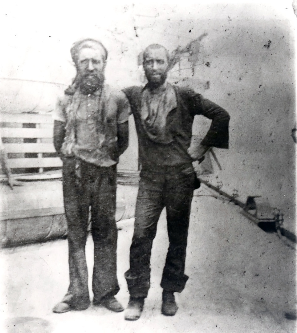 Jim lyones (left) and an unknown fireman stand on the deck of the U.S.S. Oregon.