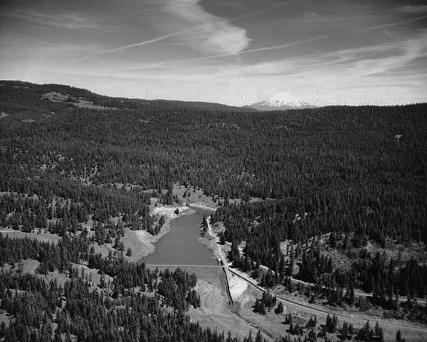 Keene Creek Dam and Reservoir provides water for the Green Springs Powerplant. May 1970.