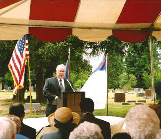 Bob Speckman speaking at centennial of return of Jason Lee's remains, June 18, 2006.