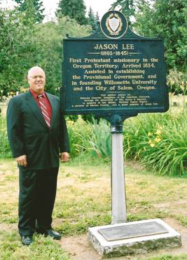 Cemetery Board Chair James Momyer with commemorative plaque.