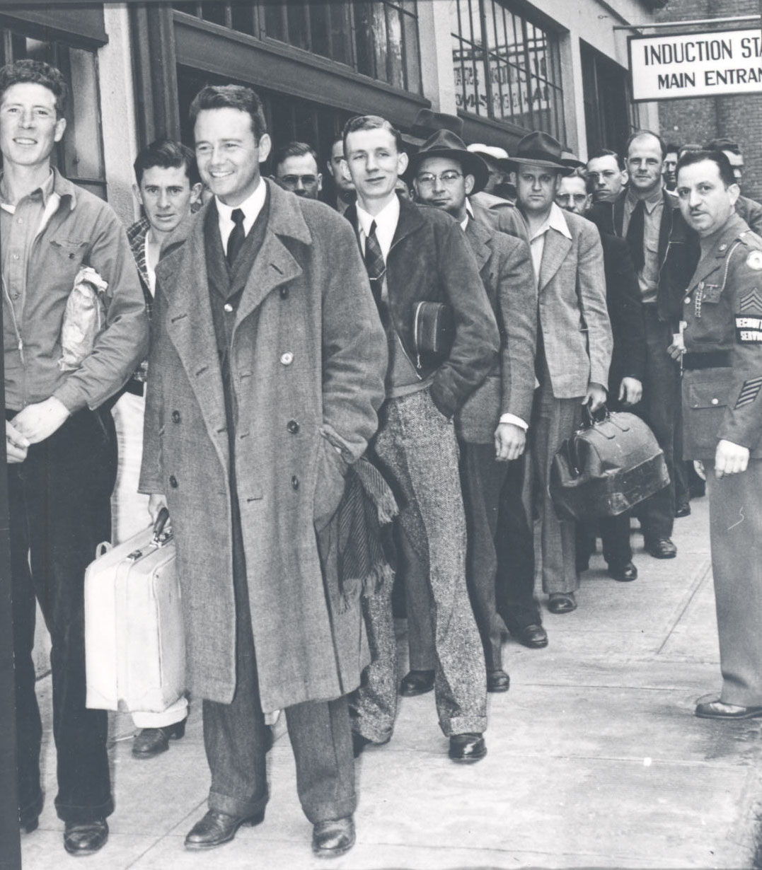 Ayres (front, second from the left) leaves Wyeth and joins the line at the induction center