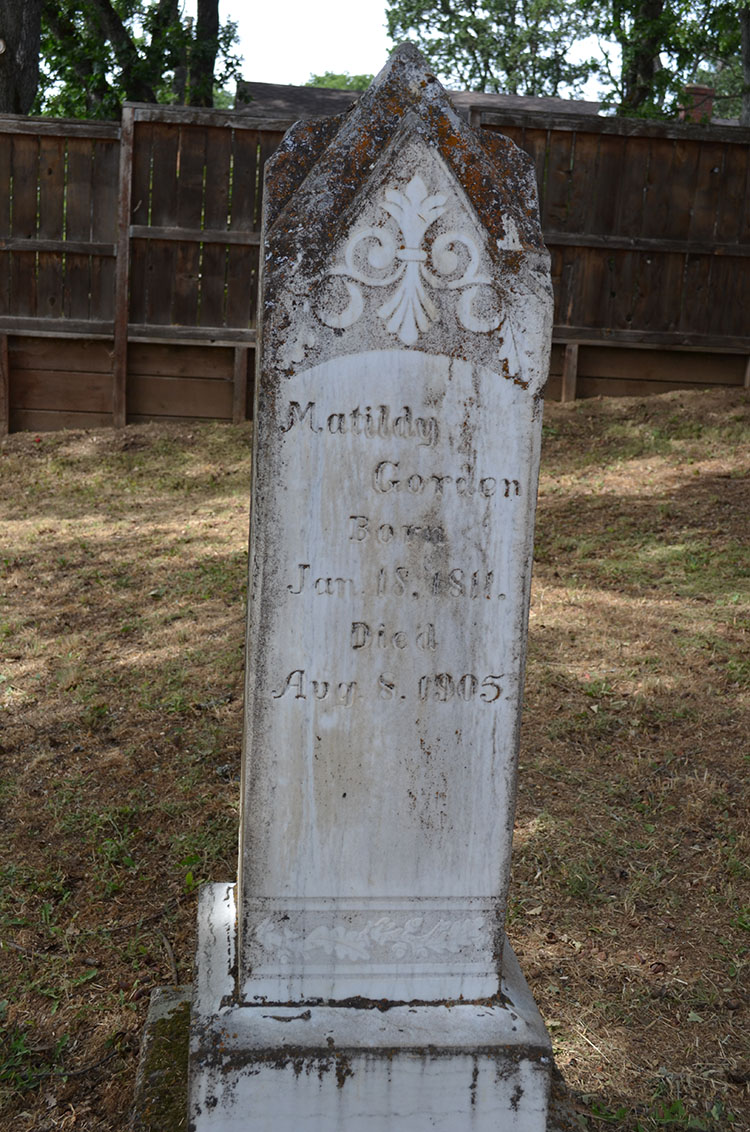 Marker with engraved oak leaves