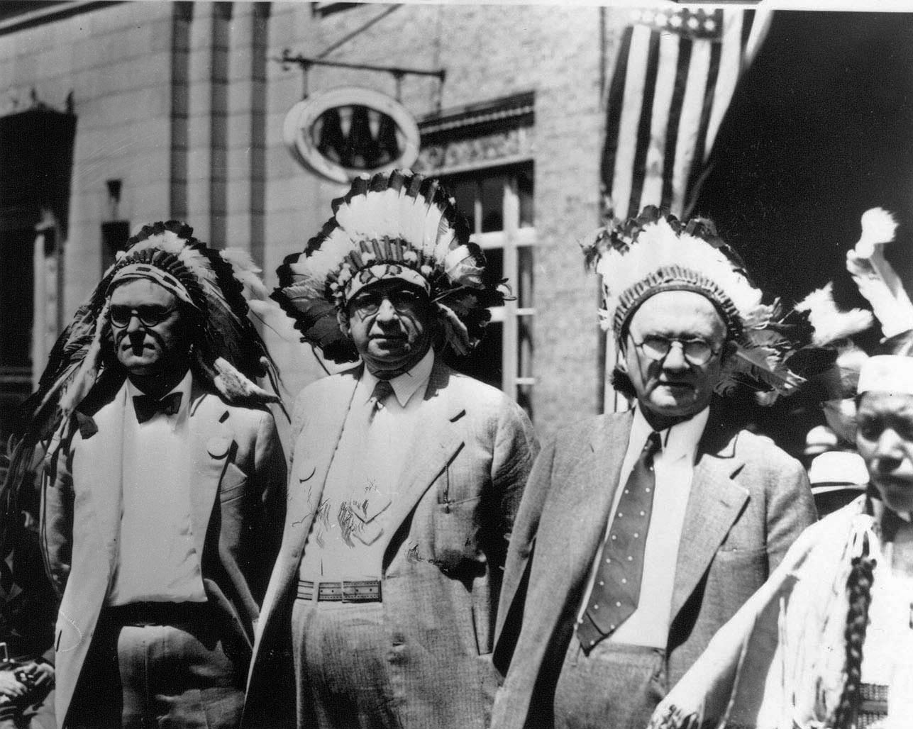 USBR officials (l to r) Frank Banks, Elwood Mead, and R.F. Walt during tribal celebration at Coulee Dam, Colorado, March 1935.