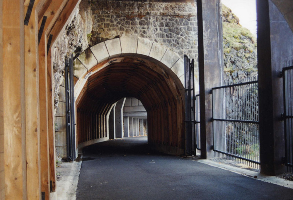 The Mosier twin tunnels were built in 1921 as part of the Columbia River Highway and re-opened in 2000 as part of a recreational trail network.