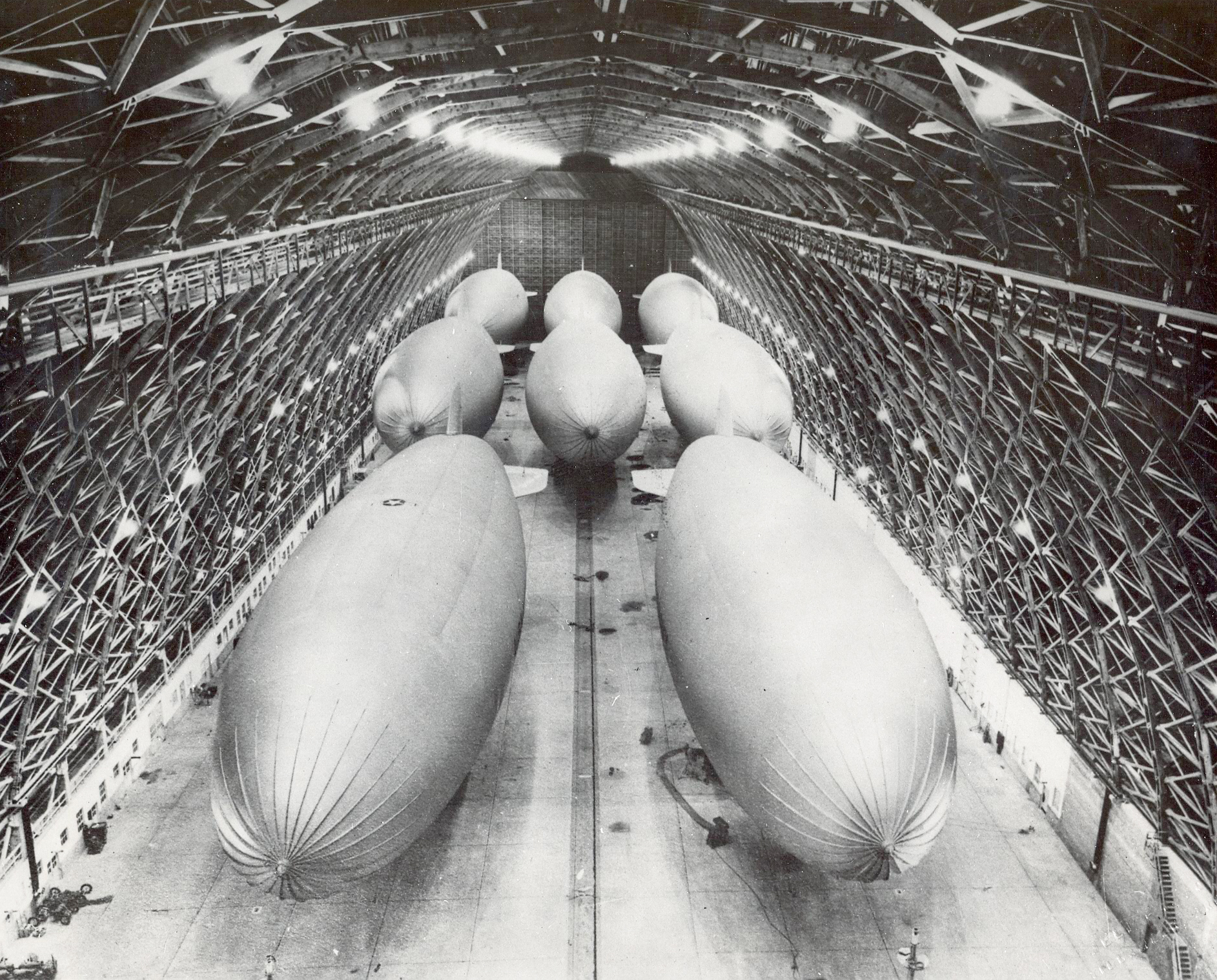 Eight K-class airships of Squadron ZP-33 in hangar at Naval Air Station Tillamook.