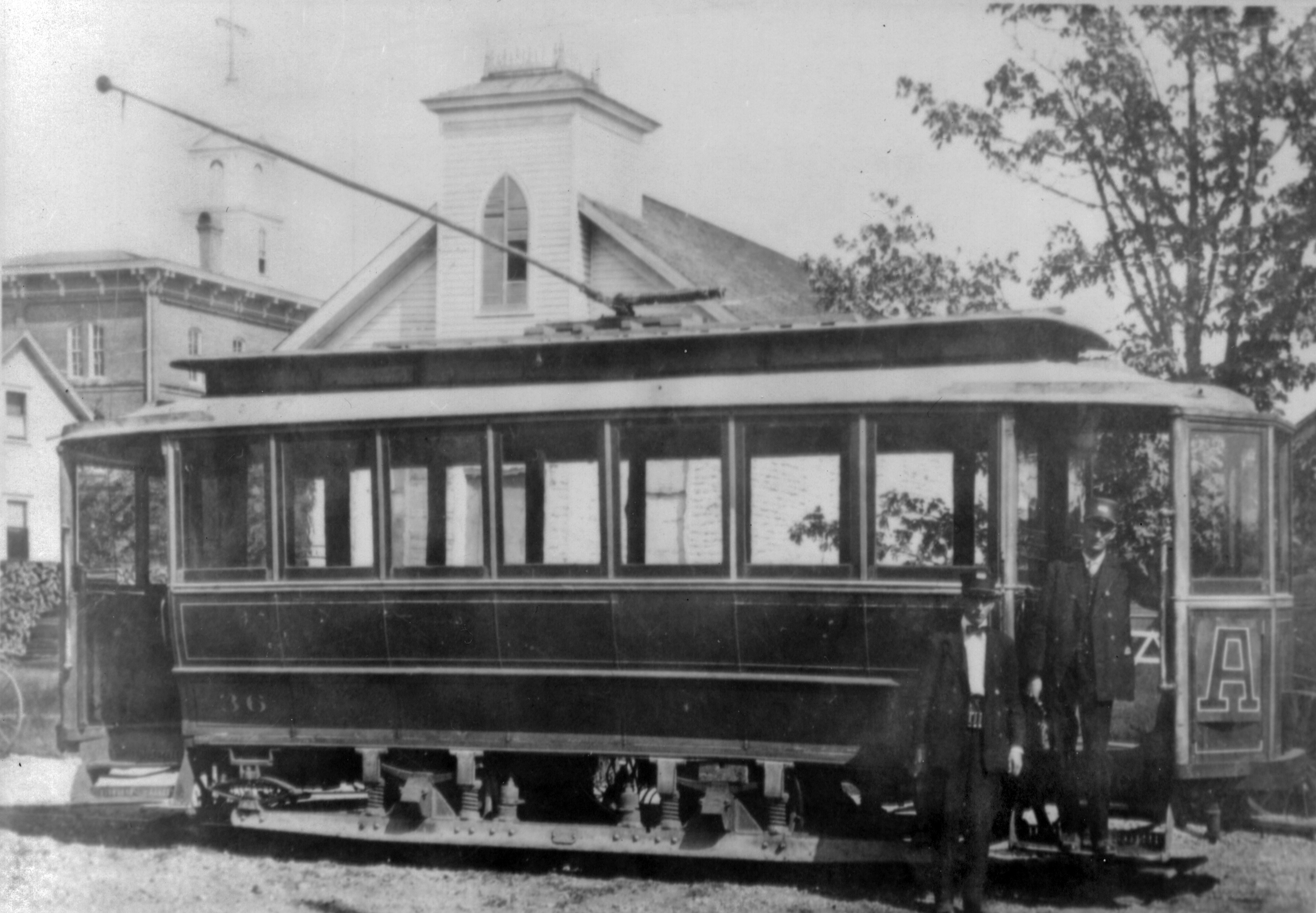 Crew of Asylum Ave. Line car 4 in front of Catholic Youth Bldg., Center St., Salem.