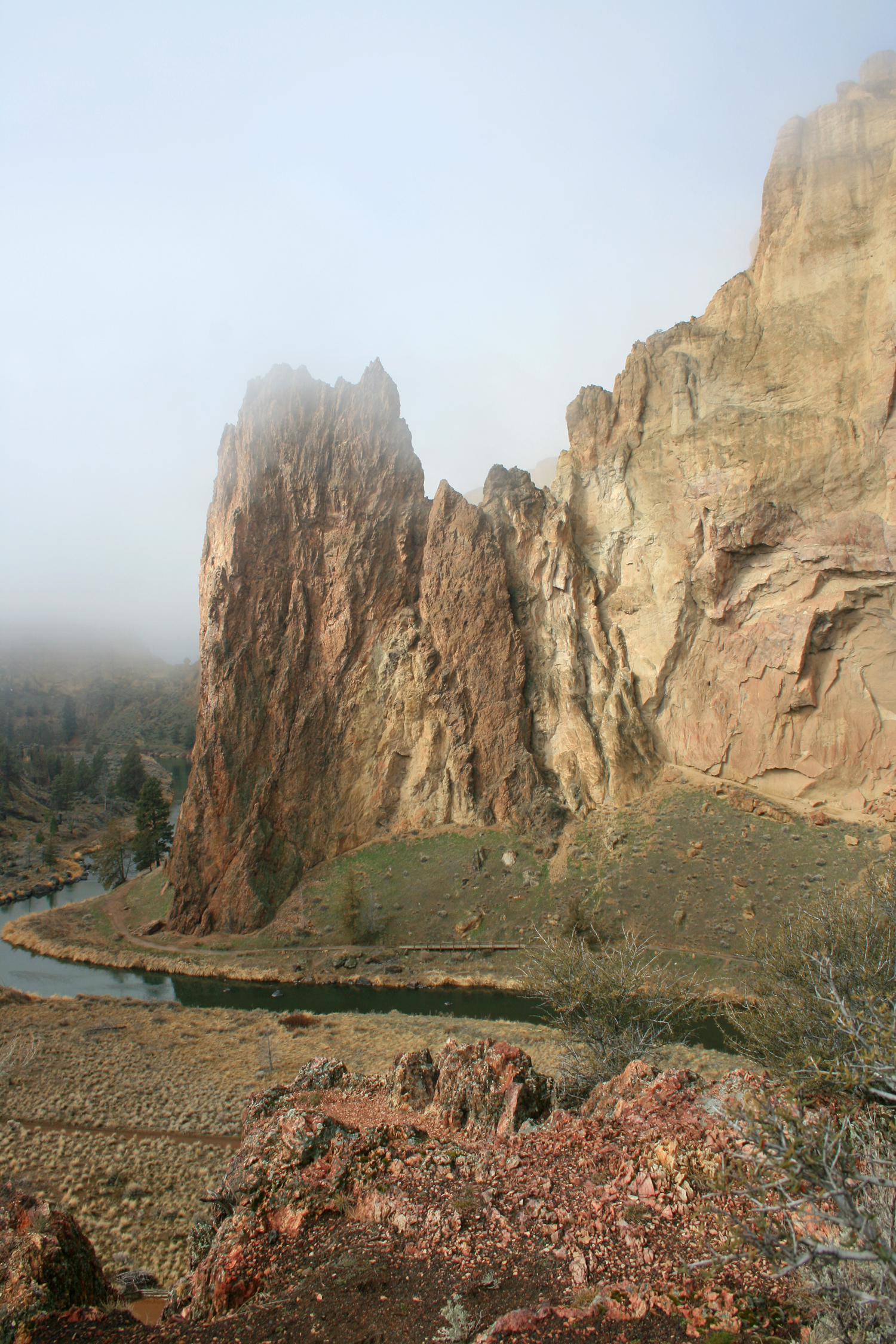 Rhyolite dike intruding tuff of Smith Rock along Crooked River, looking west from main park overlook.