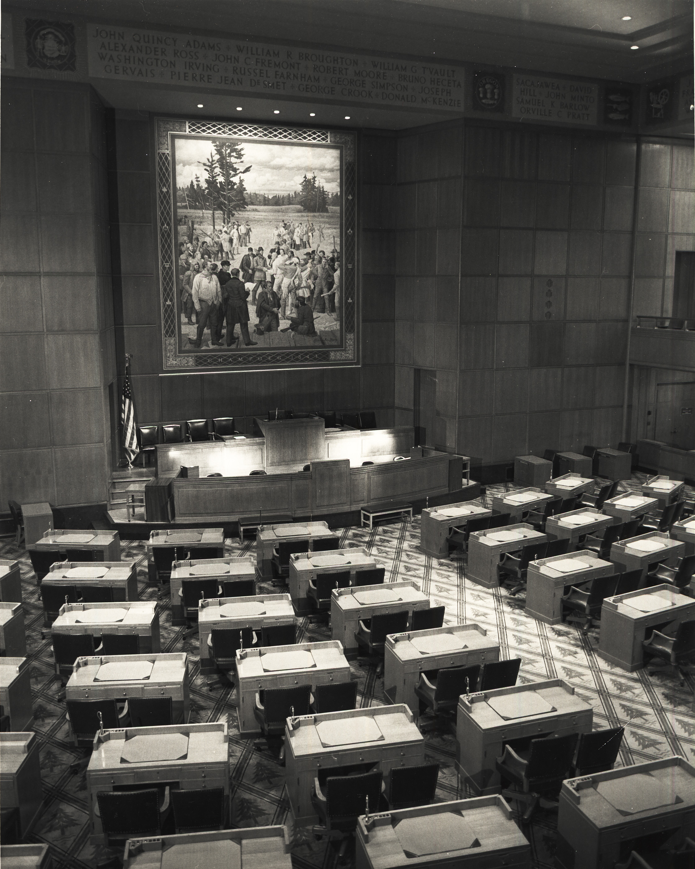 Interior of 60-seat House of Representatives, with Barry Faulkner mural depicting 1843 meeting of settlers at Champoeg that established provisional government.