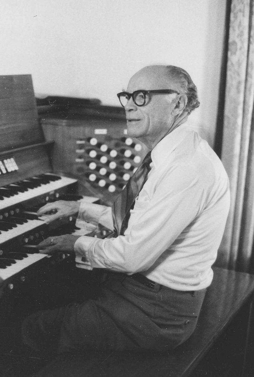 Lauren B. Sykes at the Kimball pipe organ he designed for his home on Mt. Tabor in Portland, 1973.