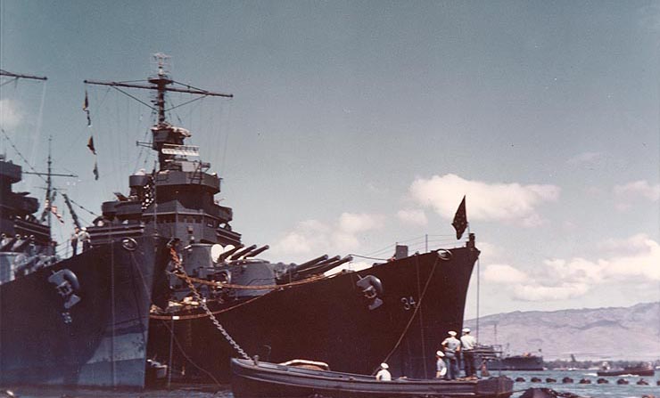 U.S.S. Astoria (CA-34) (r) and U.S.S. Minneapolis (CA-36) moored near Aiea Landing, Pearl Harbor, late June 1942.