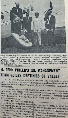 M. Penn Phillips is located on the far left in the photo.