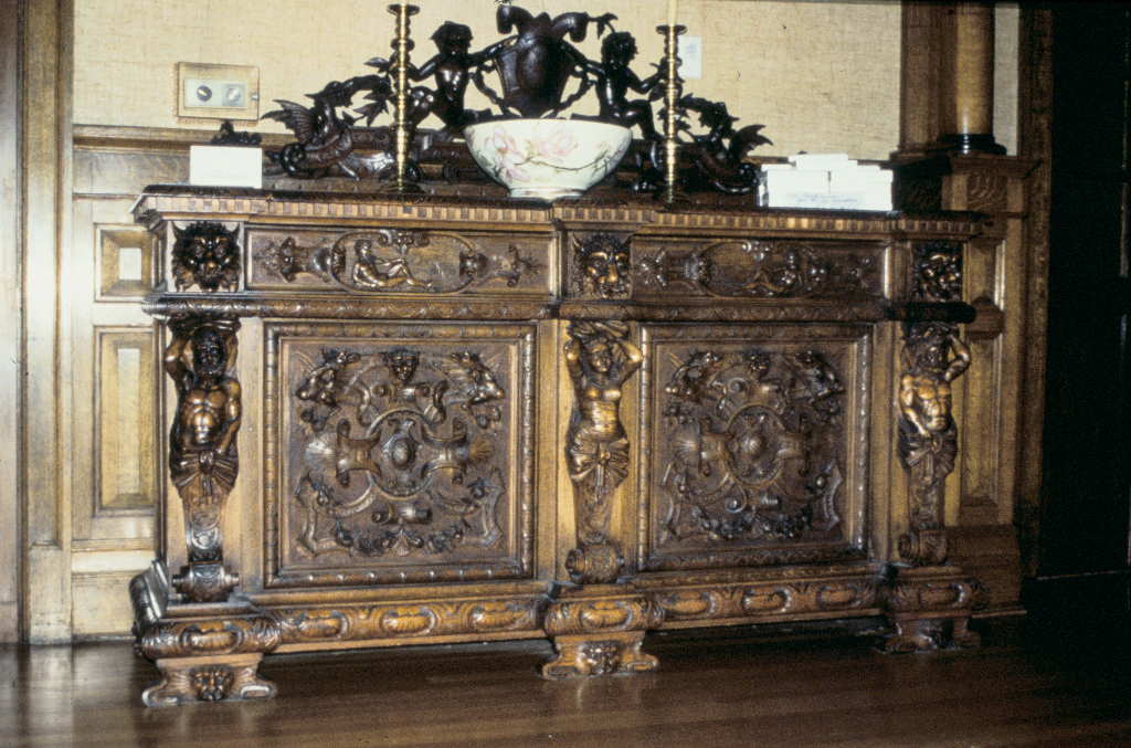 Main hall with carved credenza.